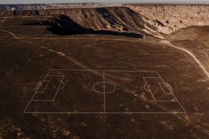 Ayman Yossri Daydban, _A rock garden in the shape of a full-sized soccer field_ (2024). Exhibition view: Desert X AlUla (9 February–23 March 2024). Courtesy The Royal Commission for AlUla. Photo: Lance Gerber.